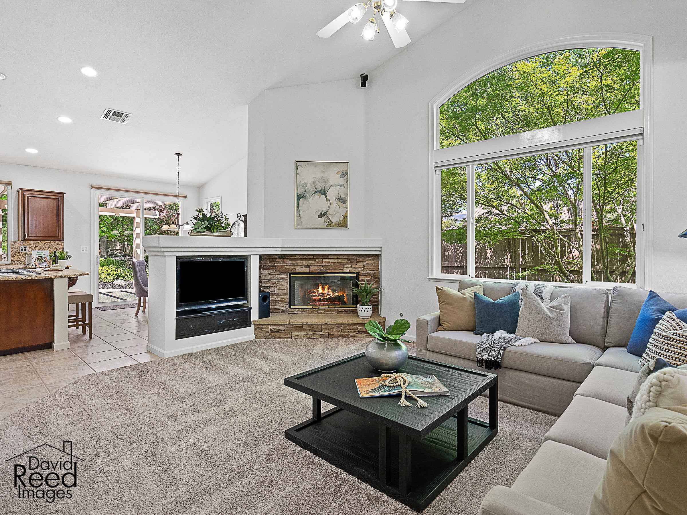 4000_MeadowWoodDrive_Int_FamilyRoom_1_02_WithFire