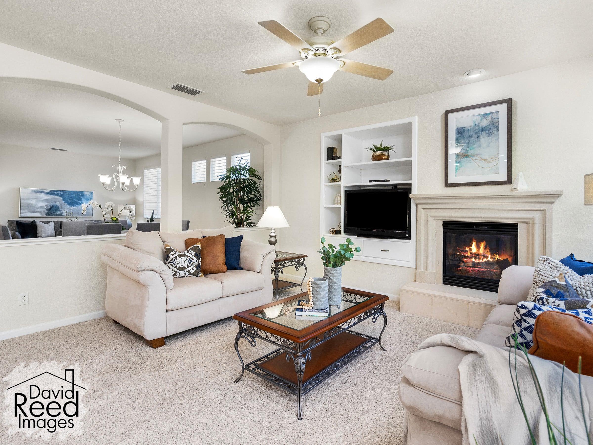 4142_TorrazzoWay_Int_FamilyRoom_1_02_WithFire