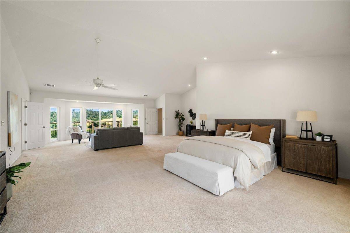 Nestled on 9.3 acres, this 3 bed, 3 bath estate offers 3,672 sq ft of living space with gorgeous views, a built-in pool, owned solar, koi pond, hidden guest quarters, & lush landscaping! Through the front door you're immediately captivated by the grand living space and stunning views of the rolling hills beyond. The updated kitchen shines with granite countertops and a showstopping custom center island, ideal for entertaining. The dramatic light filled primary suite offers deck access, a laundry room, office, and flex space. While the ensuite bath features a sunken tub perfectly positioned to enjoy serene views, as well as a walk in closet for ample storage. Enjoy outdoor living from the back deck with built in BBQperfect for unwinding with a sunset glass of local wine. Or enjoy your morning coffee surrounded by butterflies and hummingbirds on the tranquil front deck. Energy efficient features include owned solar, dual-zone HVAC, automatic whole house generator, a high-producing well, and 1 acre-foot of PCWA ditch water. The property also includes a 1,100 sq ft non-conforming 3bed, 1bath apartment/ finished basement with private entrance ideal for guests, multi-gen living, or potential rental income. A rare retreat offering privacy, comfort, and incredible potential!
