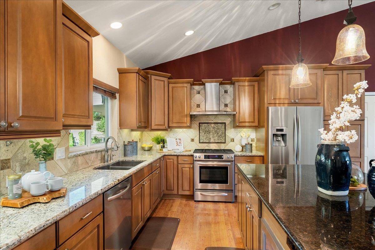 Nestled on 9.3 acres, this 3 bed, 3 bath estate offers 3,672 sq ft of living space with gorgeous views, a built-in pool, owned solar, koi pond, hidden guest quarters, & lush landscaping! Through the front door you're immediately captivated by the grand living space and stunning views of the rolling hills beyond. The updated kitchen shines with granite countertops and a showstopping custom center island, ideal for entertaining. The dramatic light filled primary suite offers deck access, a laundry room, office, and flex space. While the ensuite bath features a sunken tub perfectly positioned to enjoy serene views, as well as a walk in closet for ample storage. Enjoy outdoor living from the back deck with built in BBQperfect for unwinding with a sunset glass of local wine. Or enjoy your morning coffee surrounded by butterflies and hummingbirds on the tranquil front deck. Energy efficient features include owned solar, dual-zone HVAC, automatic whole house generator, a high-producing well, and 1 acre-foot of PCWA ditch water. The property also includes a 1,100 sq ft non-conforming 3bed, 1bath apartment/ finished basement with private entrance ideal for guests, multi-gen living, or potential rental income. A rare retreat offering privacy, comfort, and incredible potential!