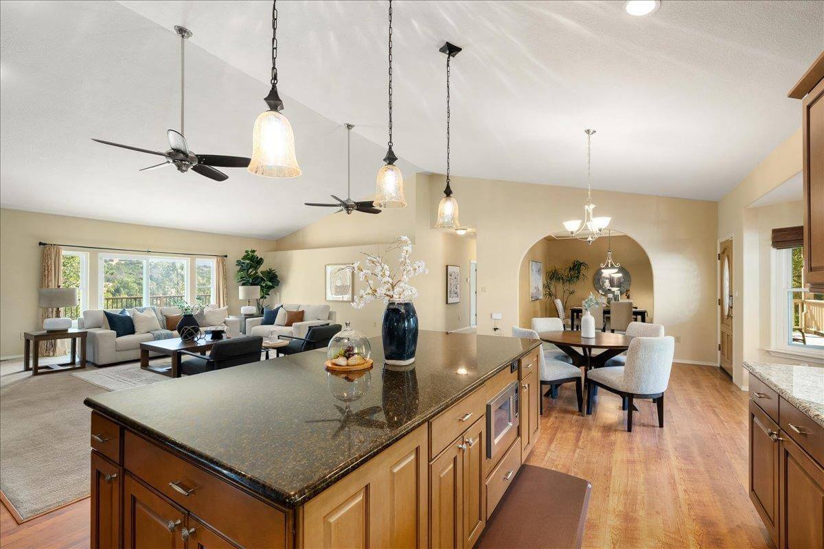 Nestled on 9.3 acres, this 3 bed, 3 bath estate offers 3,672 sq ft of living space with gorgeous views, a built-in pool, owned solar, koi pond, hidden guest quarters, & lush landscaping! Through the front door you're immediately captivated by the grand living space and stunning views of the rolling hills beyond. The updated kitchen shines with granite countertops and a showstopping custom center island, ideal for entertaining. The dramatic light filled primary suite offers deck access, a laundry room, office, and flex space. While the ensuite bath features a sunken tub perfectly positioned to enjoy serene views, as well as a walk in closet for ample storage. Enjoy outdoor living from the back deck with built in BBQperfect for unwinding with a sunset glass of local wine. Or enjoy your morning coffee surrounded by butterflies and hummingbirds on the tranquil front deck. Energy efficient features include owned solar, dual-zone HVAC, automatic whole house generator, a high-producing well, and 1 acre-foot of PCWA ditch water. The property also includes a 1,100 sq ft non-conforming 3bed, 1bath apartment/ finished basement with private entrance ideal for guests, multi-gen living, or potential rental income. A rare retreat offering privacy, comfort, and incredible potential!